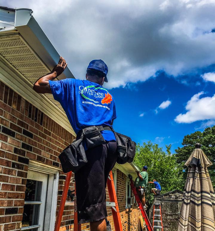 carefree worker inspecting roof